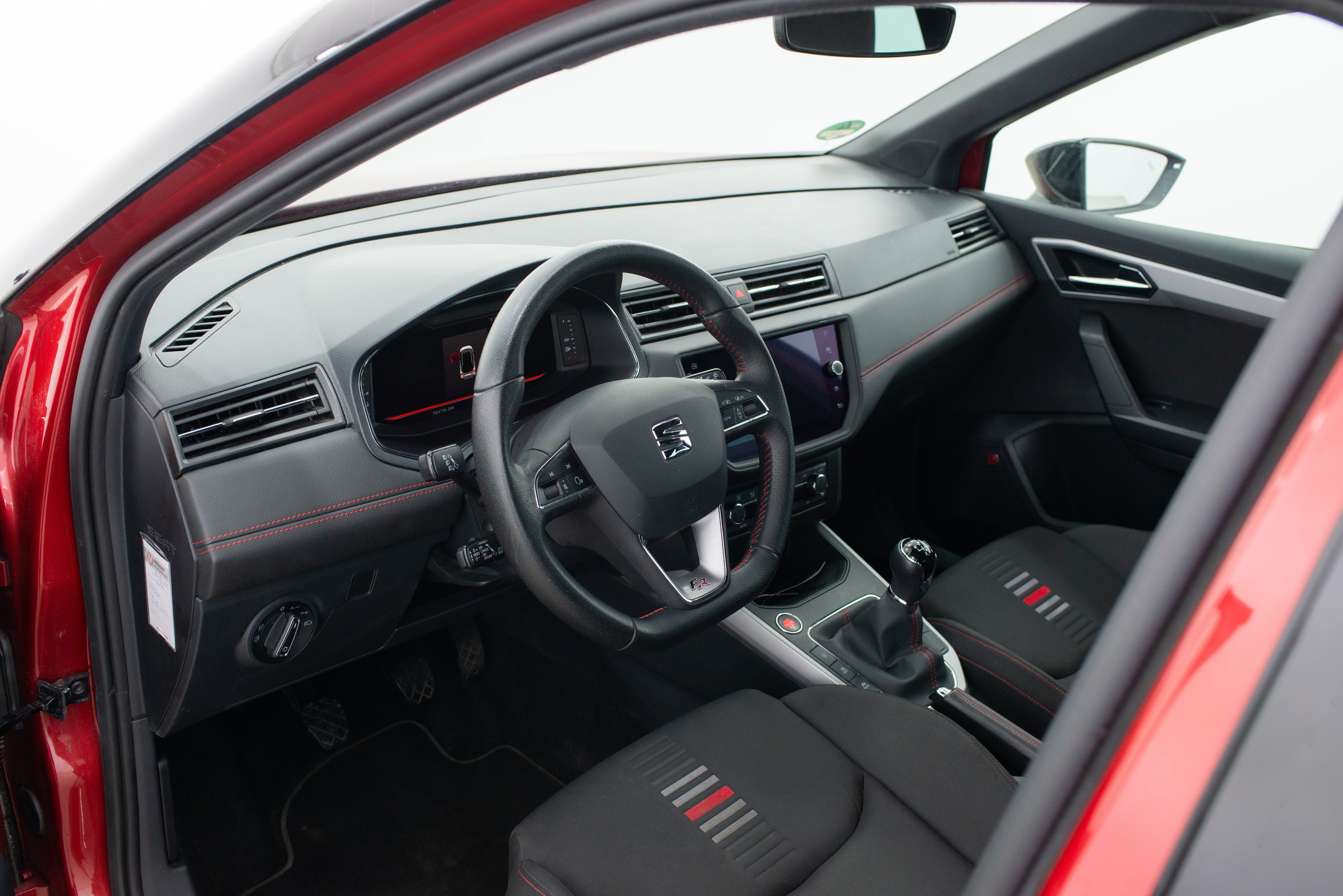 Close up of the interior of a red Seat